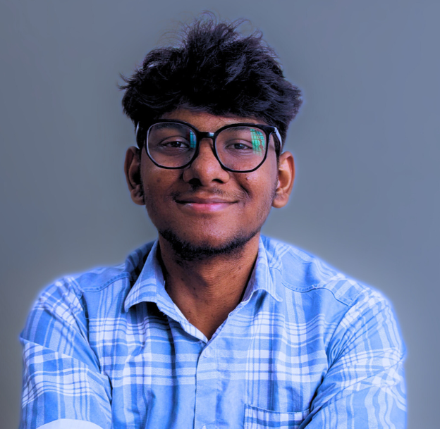 A man in a alice blue shirt with a thinking expression
